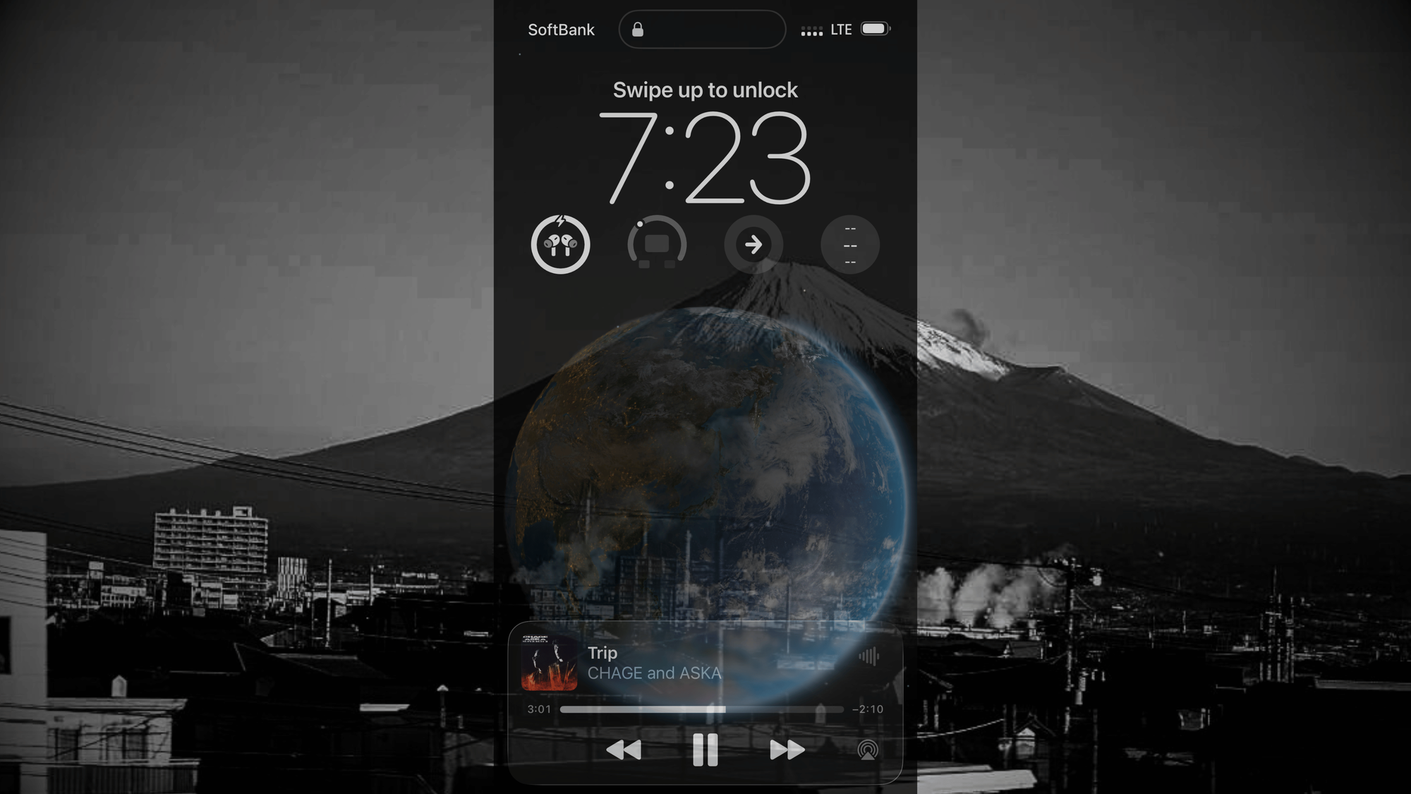 View of screen shot of Dean Bowman's phone overlayed on Mt. Fuji from the window of my train heading north to Tokyo. 